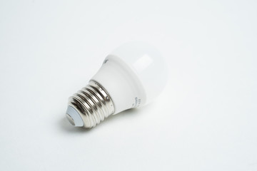 small LED lamp with a 27mm cap on a white background