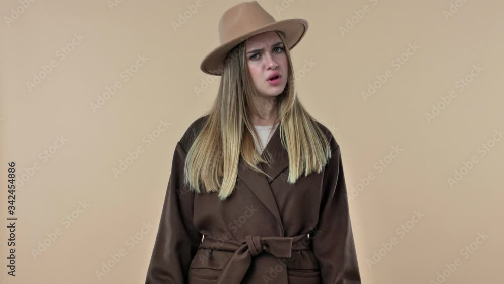 Canvas Prints a pretty nice young woman wearing hat and coat is shaking her head with negative emotions, say no is