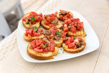 Appetizer of bruschetta with tuna