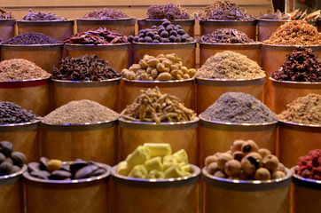 Rows & heaps of aromatic spices & herbs on display at the famous Spice Souk market in Baniyas Street, in locality of Al Ras, Deira, Dubai adjacent to the Gold Souk. It's a famous tourist destination