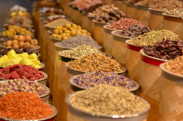 Rows & heaps of aromatic spices & herbs on display at the famous Spice Souk market in Baniyas Street, in locality of Al Ras, Deira, Dubai adjacent to the Gold Souk. It's a famous tourist destination