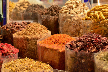 Rows & heaps of aromatic spices & herbs on display at the famous Spice Souk market in Baniyas Street, in locality of Al Ras, Deira, Dubai adjacent to the Gold Souk. It's a famous tourist destination