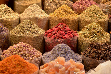 Rows & heaps of aromatic spices & herbs on display at the famous Spice Souk market in Baniyas Street, in locality of Al Ras, Deira, Dubai adjacent to the Gold Souk. It's a famous tourist destination