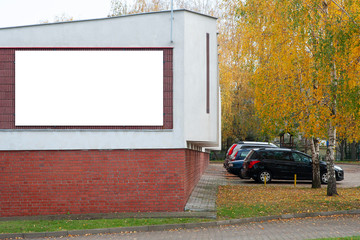 Blank white advertising billboard in the city