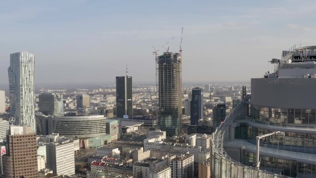 Drone 4k. View of city during Coronavirus. Warsaw in Poland. Skyscreapers, buildings, streets.