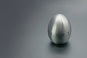 An iron egg on a dark