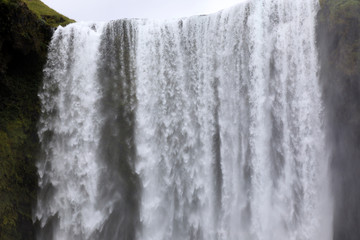 Skogafoss / Iceland - August 15, 2017: Beautiful and famous Skogafoss waterfall in South of...