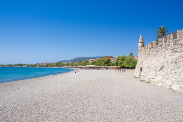 View of the beach of Nafpaktos, Lepanto with the fortress, Greece.