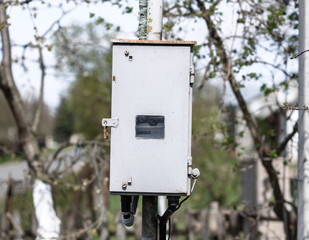 gray gas counter on pole

