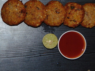Sago fried patties served with tomato ketchup