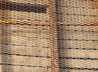Metal coating of the pedestrian path of the bridge over the river close-up in summer. (Background,...