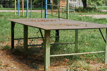 Rusty Iron Ping Pong Table in the Yard