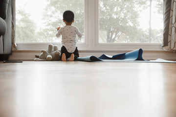 Toddler bored at home during quarantine  with copyspace