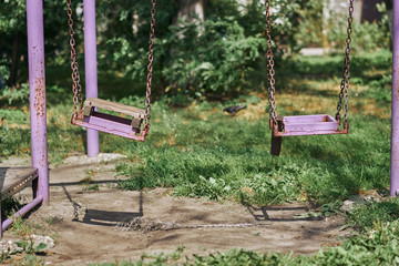 Homemade old children's swing in the yard