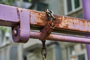 Rusty chain of children's swing