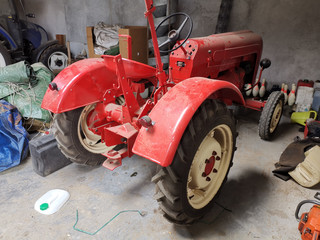 Old Red Farm Tractor. Agriculture equipment. Machinery