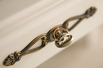 wedding rings on the handle
