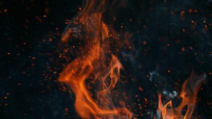 Fototapeta na wymiar Closeup of fire on black background
