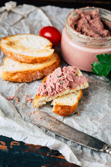 Delicious homemade liver pate on a slice of wheat toast