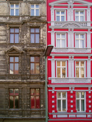 Contrast between Prussian buildings in the quarter of Kreuzberg in the city of Berlin. Germany.