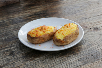 baked potato on a white plate
