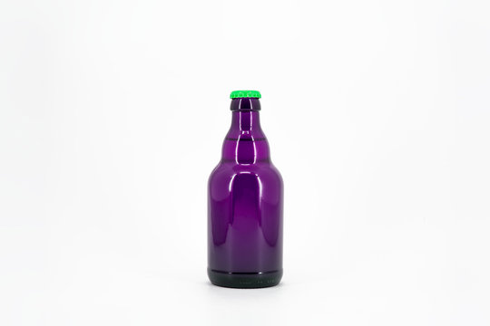 Purple bottle isolated on white background.Can be use for your design.High resolution photo.