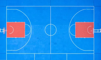Fotobehang view on basketball court from drone © Ruslan