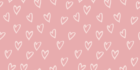Seamless heart hand drawn pattern in vector illustration. Rose and pink nursery colors cute simple design for scrapbooking wallpaper textile craft paper. Muted illustration colors for aesthetic.