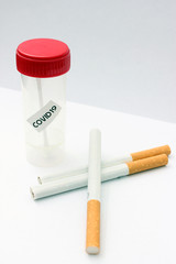 COVID-19 test sample near cigarettes 