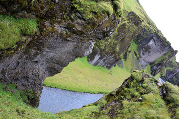 Sudhurland / Iceland - August 15, 2017: River flow through the great canyon of Fjadrargljufur.