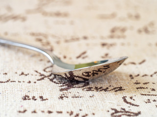 spoon with vintage cloth reflection