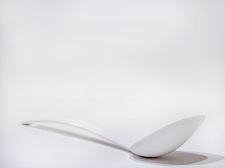 white serving spoon on white