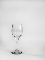 empty wine glass on white