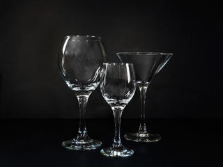 wine glasses on black background