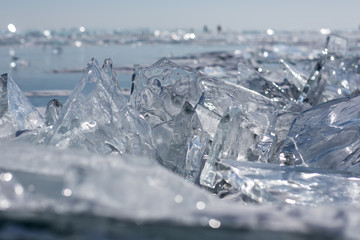 Beautiful clear ice of Lake Baikal on a sunny day