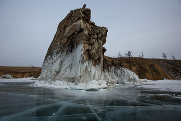 Icy rocky coast in sunny weather
