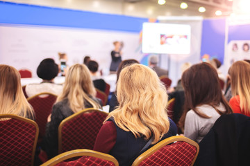 Business woman and people Listening on The Conference. Horizontal Image