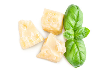 Three slices of permesan reggiano and basil bush