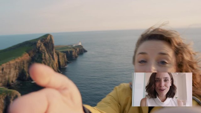 happy travel woman video chatting with best friend blowing kiss sharing vacation in scotland having fun showing ocean and waving