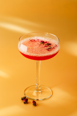 Pink Raspberry Cocktail in drink glass