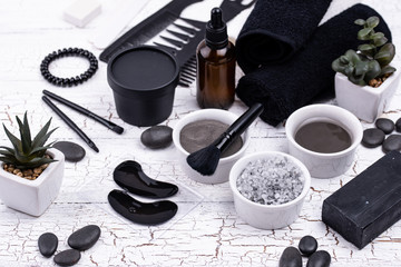 Obraz na płótnie Canvas Set of black charcoal detox cosmetics