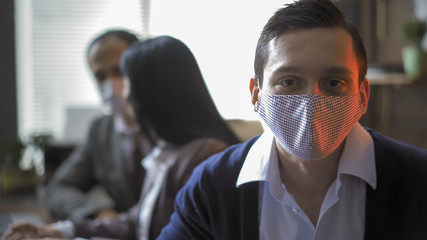 Colleagues Working In Office During Quarantine