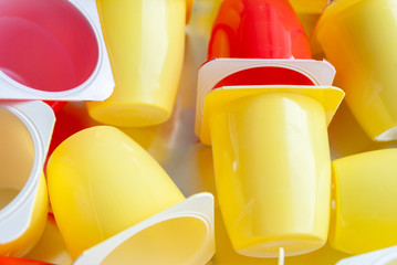many colored plastic cups close-up
