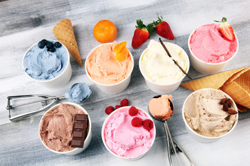 Various of ice cream flavor with fresh blueberry, strawberry, almond, chocolate, vanilla setup on...