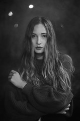 Fototapeta premium Black and white portrait of a woman in smoke