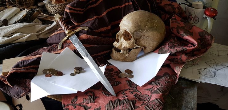 Skull and dagger. Pirate's table.