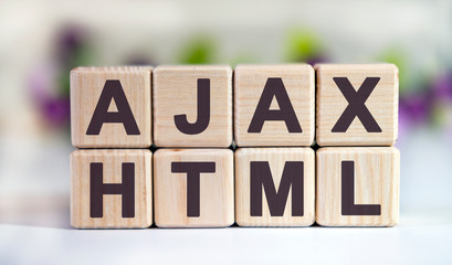 AJAX HTML - text on wooden cubes on a floral background with tulip buds