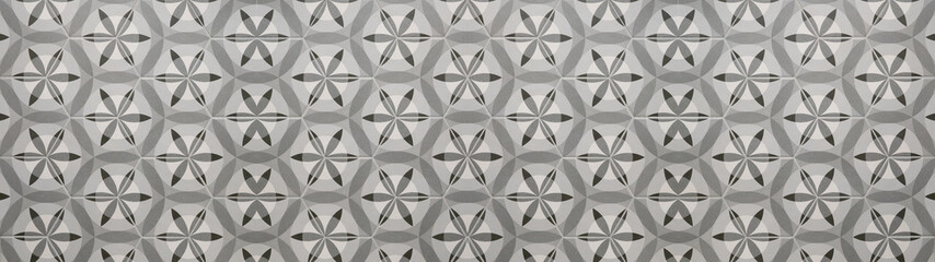 Gray white vintage retro geometric square mosaic motif cement tiles with circle flower blossom print texture background banner panorama