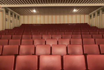 Empty red theater seats after the cancellation of cinemas regarding corona virus