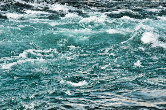 Rough water waves in a river